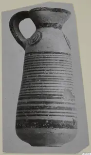 Pottery White Painted IV juglet from Amathus, with a strap handle, concentric circles on the shoulder and horizontal bands on the body