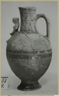 Bichrome-Red jug from Marion with a small modelled animal figure on the shoulder