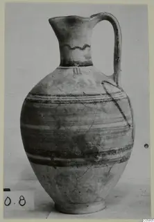 Jug with a single handle, painted bands and a wavy line on the neck, from Marion