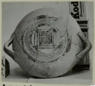 White Painted I bowl with concentric painted rings and a cross-hatched central square, seen from above