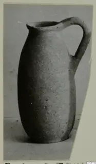 Plain pottery jug with a single strap handle, from Marion