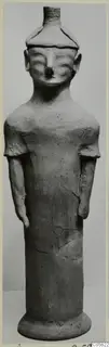 Terracotta statuette of a standing figure with arms at its sides, from Ayia Irini