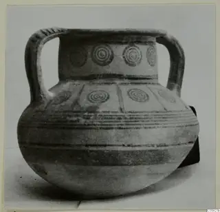 Two-handled pottery jar from Idalion, decorated with concentric circles and horizontal bands