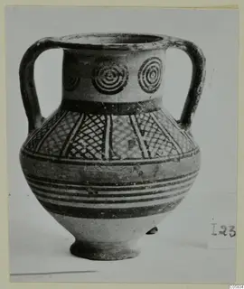 Two-handled jar with concentric circles on the neck and cross-hatched panels on the body, painted in dark bands