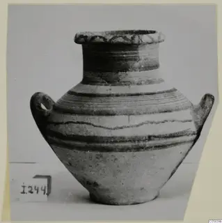 Pottery White Painted IV, a two-handled vessel with painted bands and a looped rim pattern