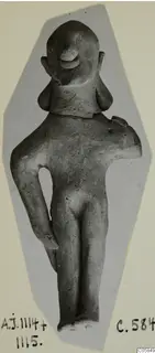 Terracotta figurine of a standing nude figure from Ayia Irini, with one arm broken off at the shoulder