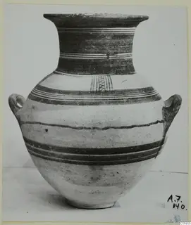 White Painted II jar from Amathus, tombs 1–9, with horizontal painted bands and two loop handles