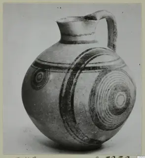 Jug from Amathus with a rounded body and dark concentric circles and bands painted on it