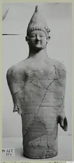 Terracotta statue of a standing figure with a tall conical headdress, broken and mended, from Mersinaki