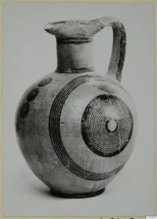 Pottery Black-on-Red II-IV juglet with concentric circle decoration on its body