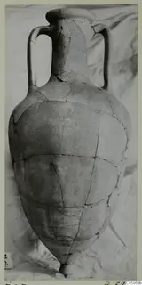 Large two-handled pottery vessel from Idalion, reassembled from fragments, photographed against a white cloth