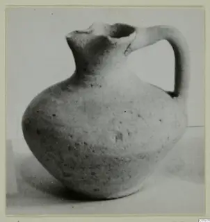 Cypro-Hell.I. jug with a single loop handle and a pinched, lipped mouth