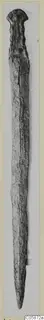 Iron sword photographed upright, long blade tapering to a point, surface heavily corroded