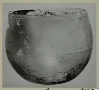 Blown glass bowl from Idalion with a rounded body and two horizontal grooves around the lower body