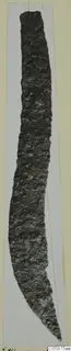 Long, narrow iron knife blade, heavily corroded, curving and tapering to a point