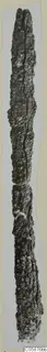 Long corroded iron weapon, shown upright against a pale background