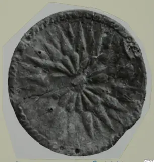 Round metal disc with radiating ridges around a central boss, Idalion bronze find