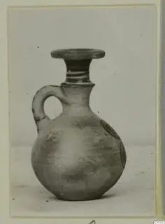 Pottery Bichrome IV, Plate - Jug: small jug with a flat-topped mouth, banded neck and concentric circle motifs on the body