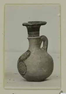Pottery Bichrome IV jug from Idalion with a loop handle and concentric circle motifs on its body