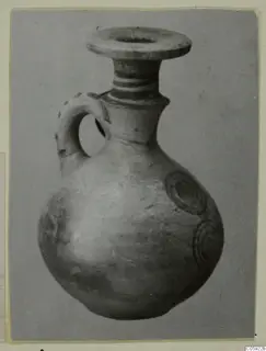 Jug, Pottery Bichrome IV, with a flared rim, banded neck and concentric circle motifs on the body