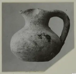 Small jug with a single loop handle, Plain White ware, from Idalion
