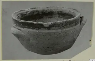 Pottery White Painted IV: a bowl with a thick rim and two small lugs on the body