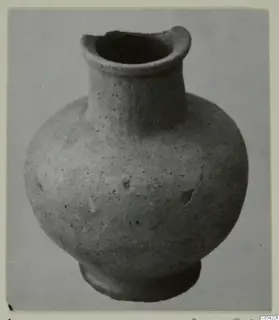 Hand-made pottery vessel with a flared neck and ring base, from Idalion.
