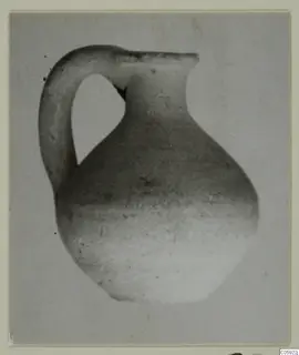 Pottery Plain White IV-V jug with a single strap handle, shown alone against a plain grey backdrop