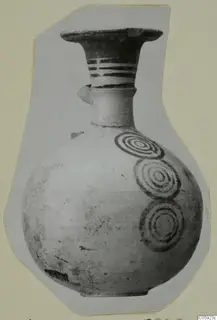 Pottery Bichrome IV jug with concentric circle motifs and painted neck bands, from Idalion