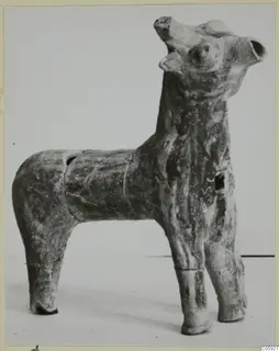 Terracotta figurine of a standing four-legged animal with its head raised and ears upright, from Ayia Irini