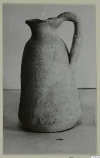 Plain White pottery jug with a single strap handle