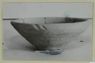 Pottery Plain White VII bowl from Marion, tombs 46–60, photographed on a pale surface