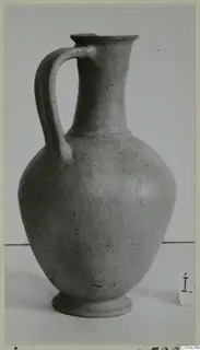 Pottery Plain White Wheel-made jug with a single strap handle, from Idalion