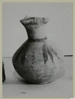 Pottery Bichrome V vessel with a flared rim, narrow neck and dark painted bands, from Idalion