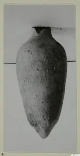 Plain White I-III pottery vessel from Idalion, with a narrow neck and pointed base