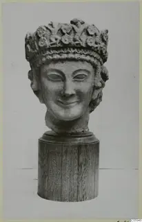 Limestone sculpted head of a woman wearing a leafy crown, from Vouni.