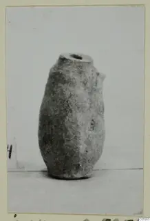 Small pottery vessel with a rounded body and narrow neck, from Idalion