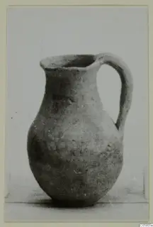 Plain White pottery jug with a wide mouth and a single handle, from Idalion