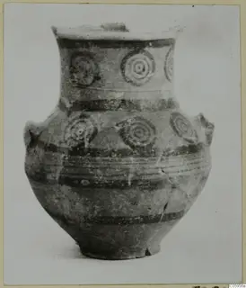 Pottery Black-on-Red II-IV jar with concentric circle motifs, horizontal bands and two handles