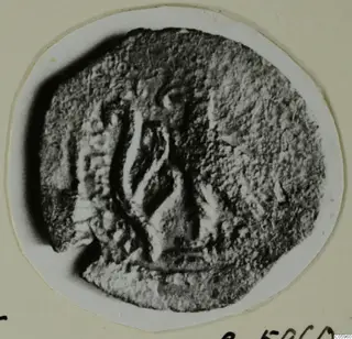 Round find with a raised pattern, from Idalion.