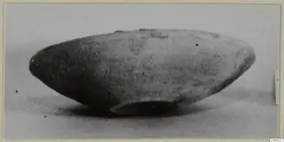 Side view of a Pottery Coarse Ware bowl with a rounded body and small ring base