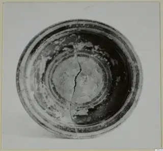 Pottery Bichrome V bowl seen from above, with concentric bands and a central disc