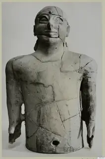 Terracotta figure from Ayia Irini: upper body with arms and head, reassembled from cracked fragments