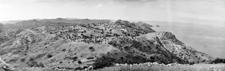 Wide view over hills from Vouni towards the coast and the sea.