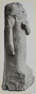 Limestone statuette of a standing figure with one arm raised to the chest, from Ayia Irini, photographed alone