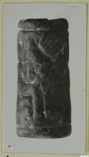 Cylindrical stone seal from Ayia Irini, shown upright on a card mount