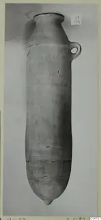 Pottery Plain White VII amphora from Vouni, tall with a narrow neck, one loop handle and a pointed base