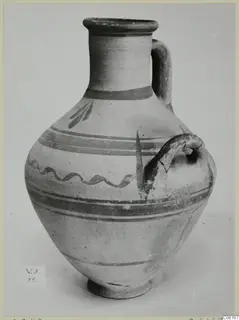 Pottery White Painted VII jug with a strap handle, painted bands and a wavy line, from Vouni