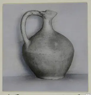 Jug from Vouni Tomb 5 with a single strap handle and a pinched spout