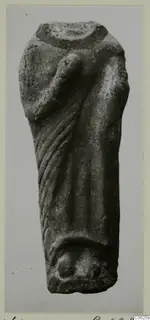 Terracotta figurine fragment of a draped standing figure, with vertical folds of cloth and a raised arm